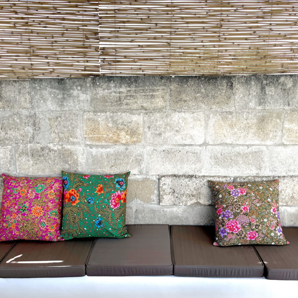 Colourful cushions by SECOND EDEN in the lounge area