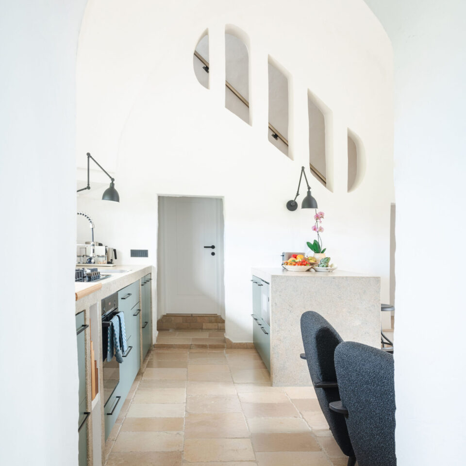 View from the dining room into the kitchen